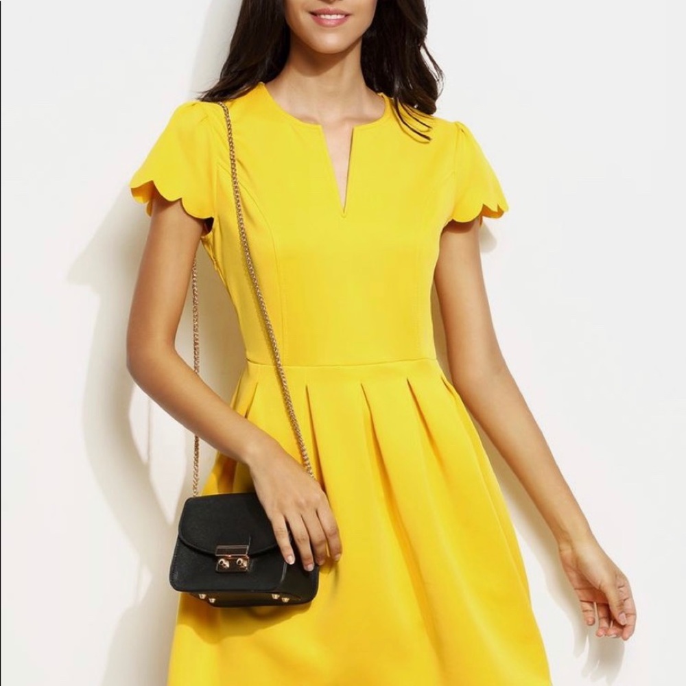 Bright yellow scalloped hem dress